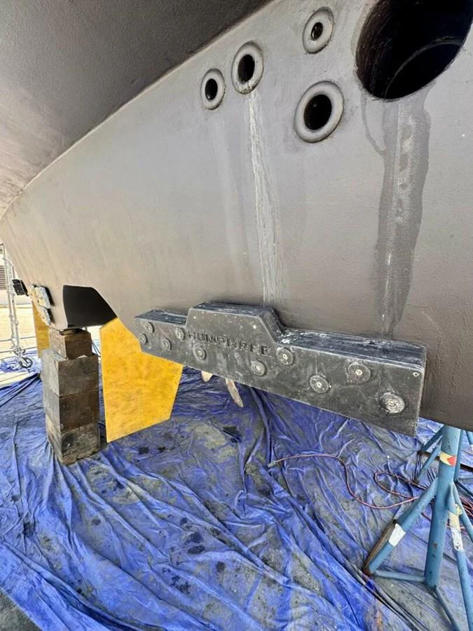 a gun on a bed aboard JULE Yacht for Sale