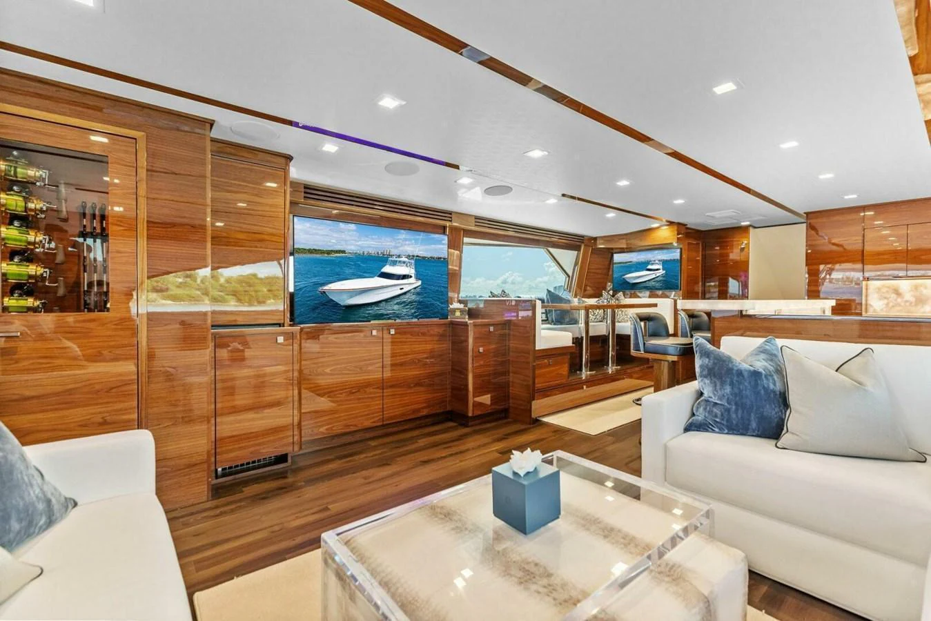 The salon features luxurious seating, modern decor, and large windows offering stunning views. aboard TEAM HARVEY I Yacht for Sale