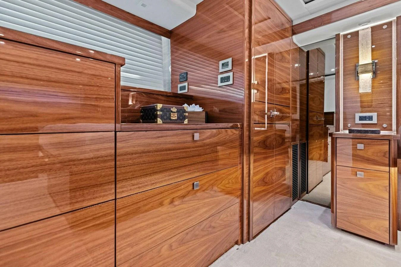 The yacht's interior features luxurious wooden cabinetry and modern fixtures. aboard TEAM HARVEY I Yacht for Sale