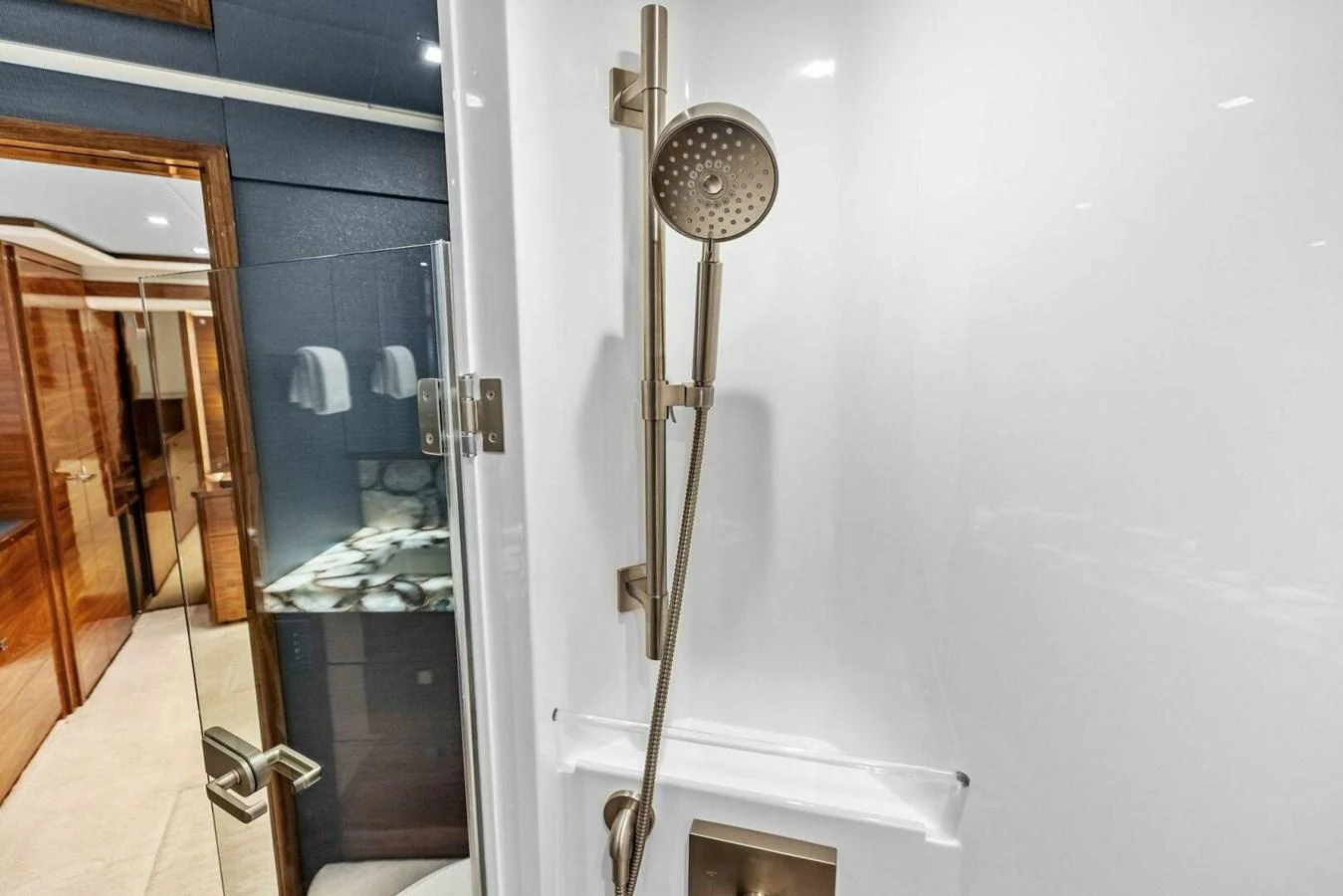 A modern yacht shower with sleek fixtures and a clean design. aboard TEAM HARVEY I Yacht for Sale