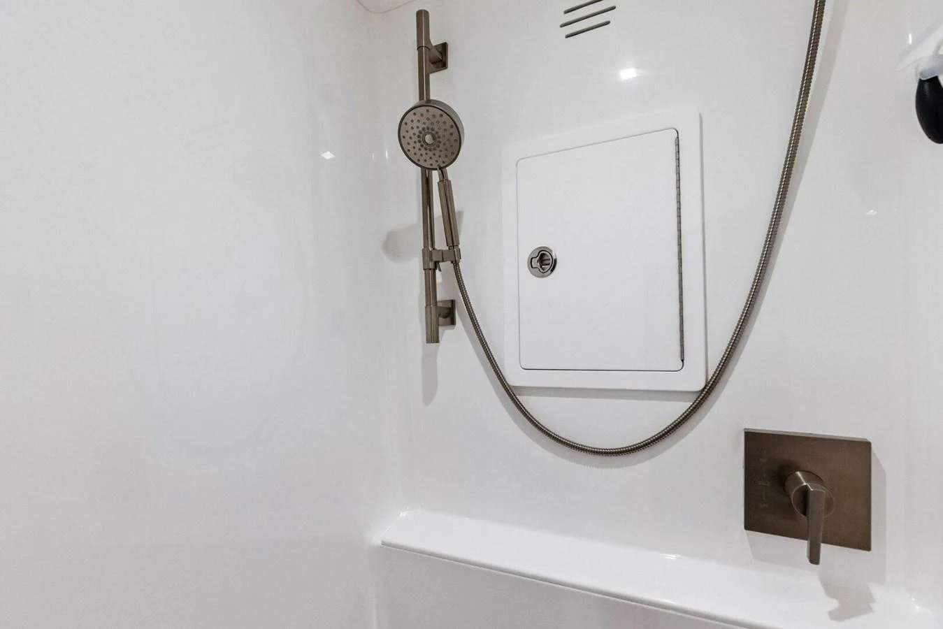 A sleek and modern shower area with minimalist fixtures. aboard TEAM HARVEY I Yacht for Sale