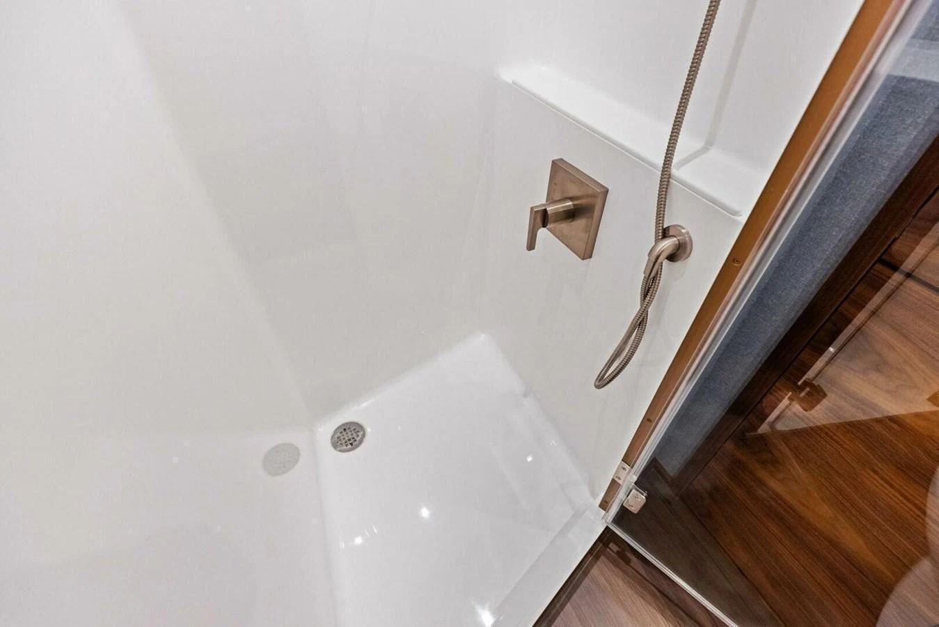 A sleek and modern shower area with a minimalist design. aboard TEAM HARVEY I Yacht for Sale