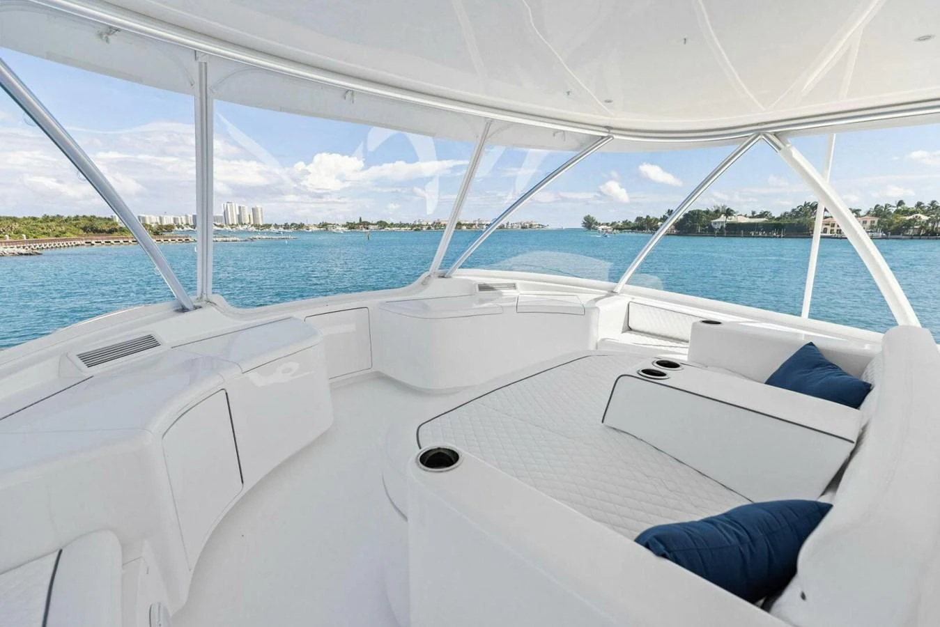 The flybridge offers a spacious and luxurious seating area with panoramic views of the surrounding waters. aboard TEAM HARVEY I Yacht for Sale