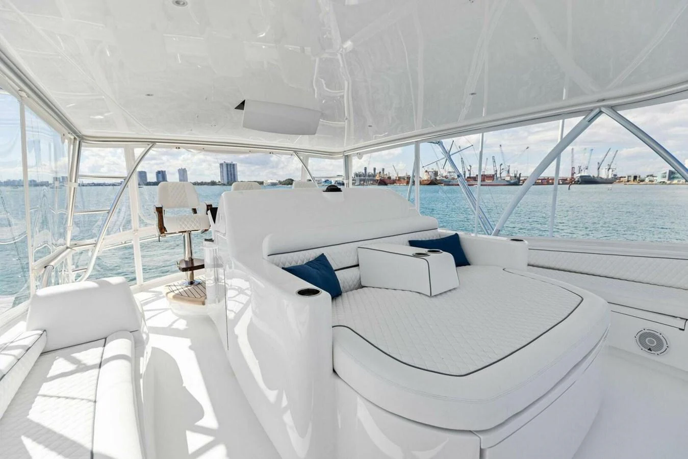 The flybridge offers a spacious and luxurious lounging area with panoramic views. aboard TEAM HARVEY I Yacht for Sale