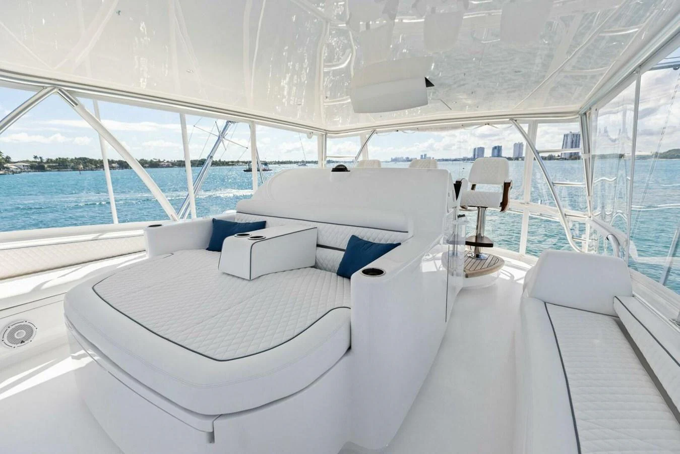 The flybridge offers a spacious and luxurious lounging area with panoramic views of the water. aboard TEAM HARVEY I Yacht for Sale