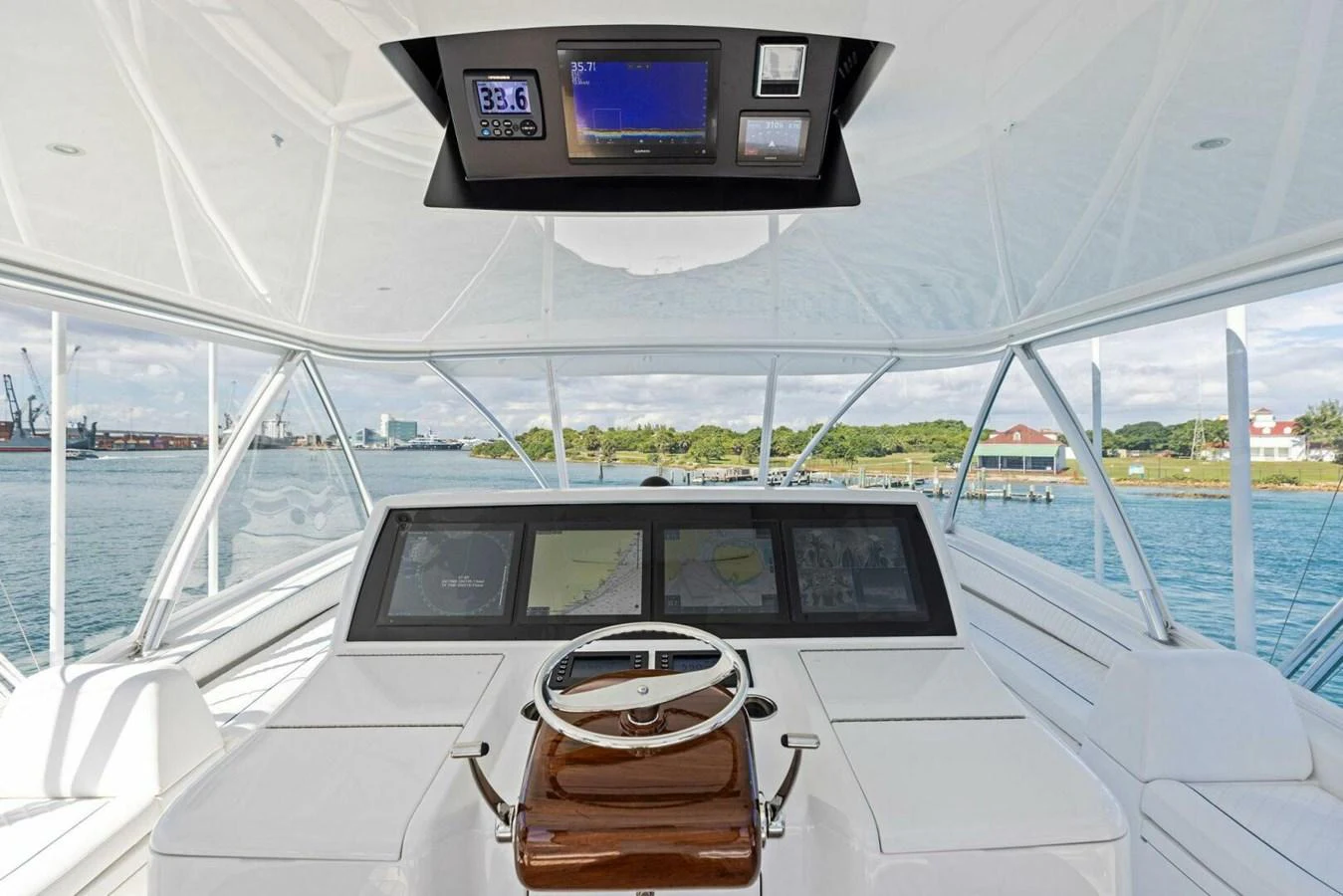 The yacht's helm offers a panoramic view with state-of-the-art navigation equipment. aboard TEAM HARVEY I Yacht for Sale