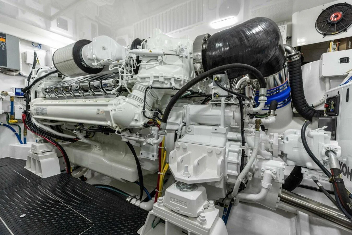 The image showcases the pristine and well-maintained engine room of the yacht. aboard TEAM HARVEY I Yacht for Sale