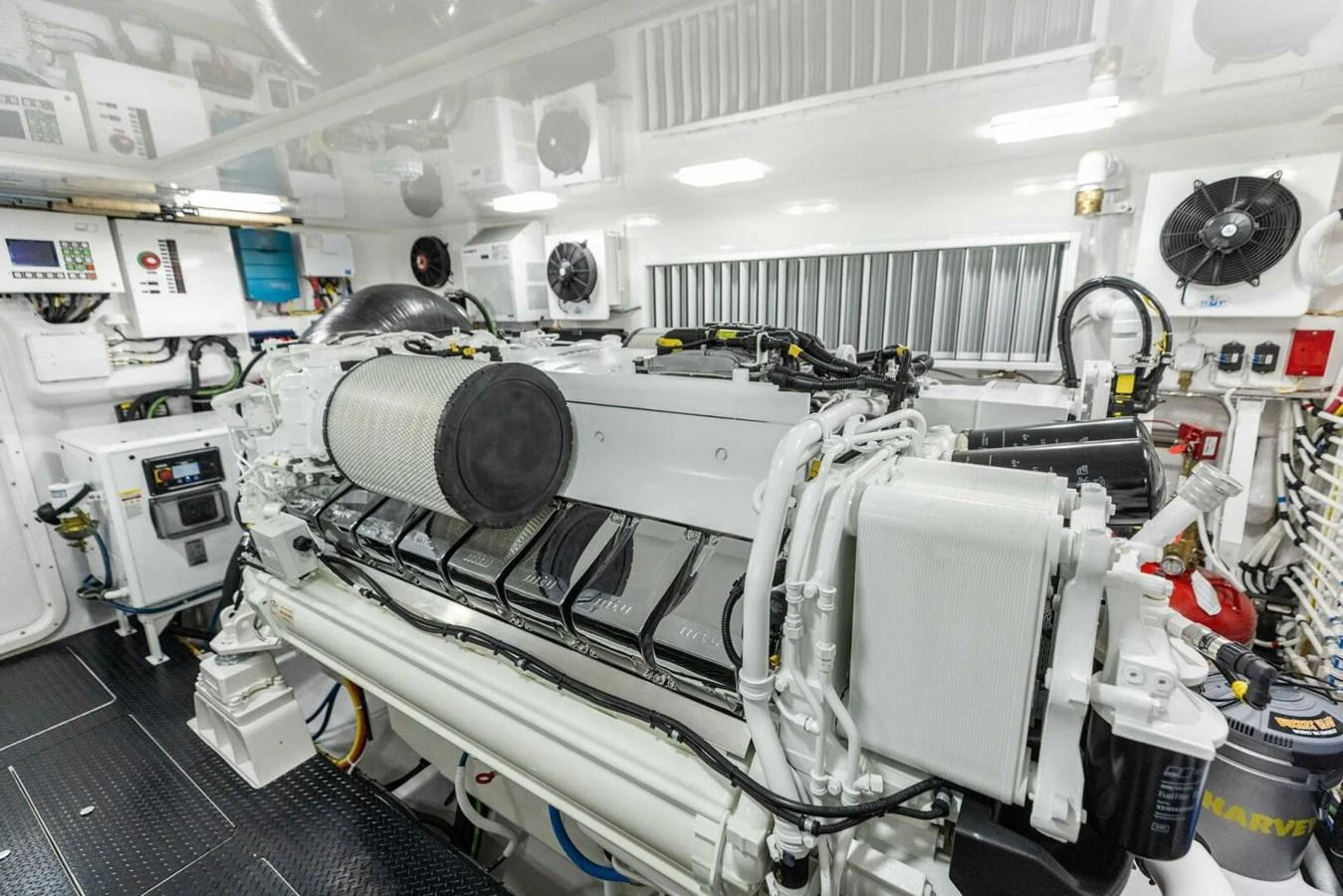 The image showcases the pristine and well-organized engine room of the yacht. aboard TEAM HARVEY I Yacht for Sale