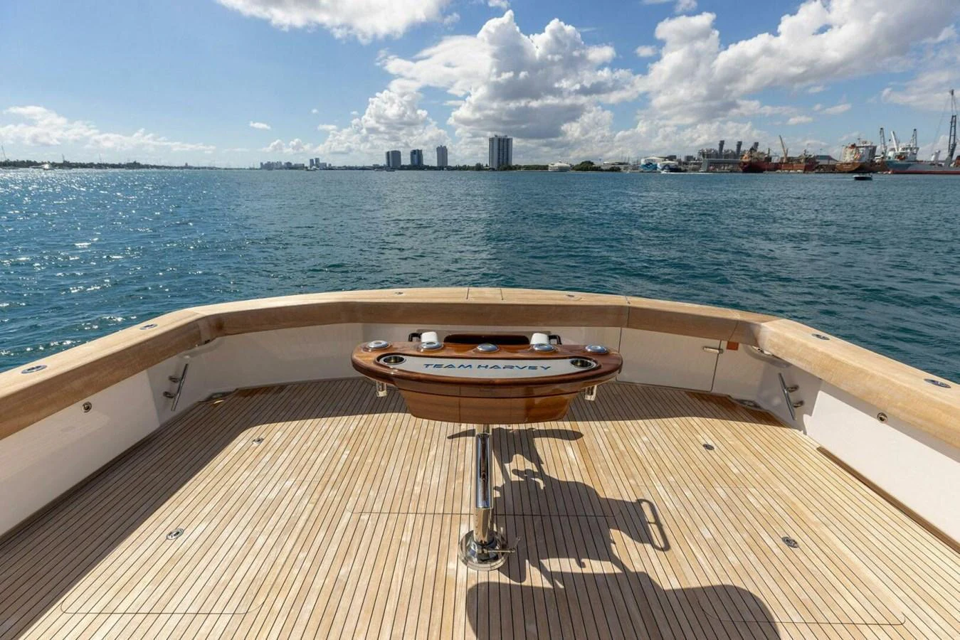 The aft deck offers a spacious and inviting area for relaxation with a stunning view of the water. aboard TEAM HARVEY I Yacht for Sale