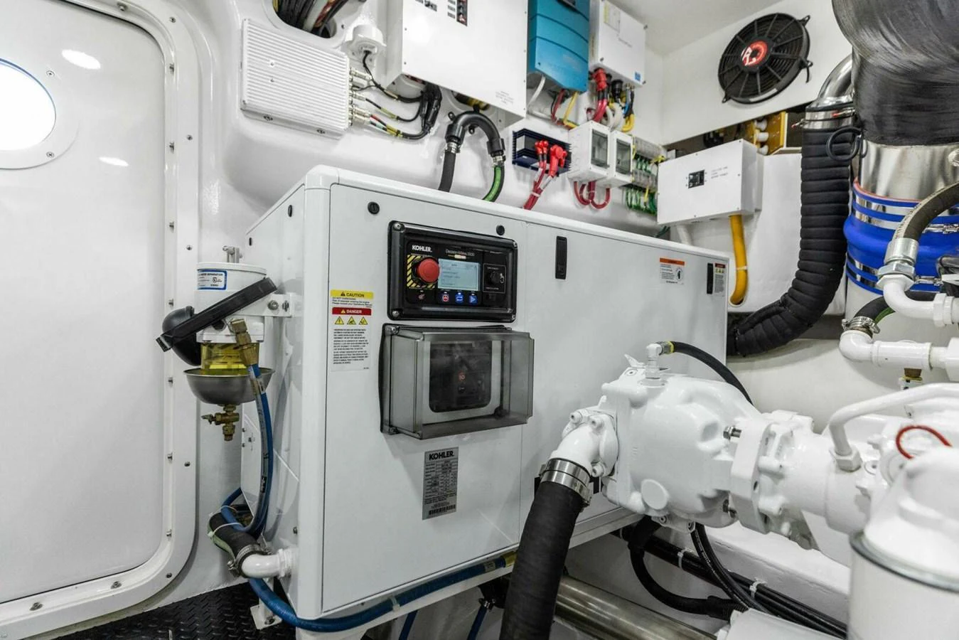 The image showcases the well-organized and high-tech engine room of the yacht. aboard TEAM HARVEY I Yacht for Sale