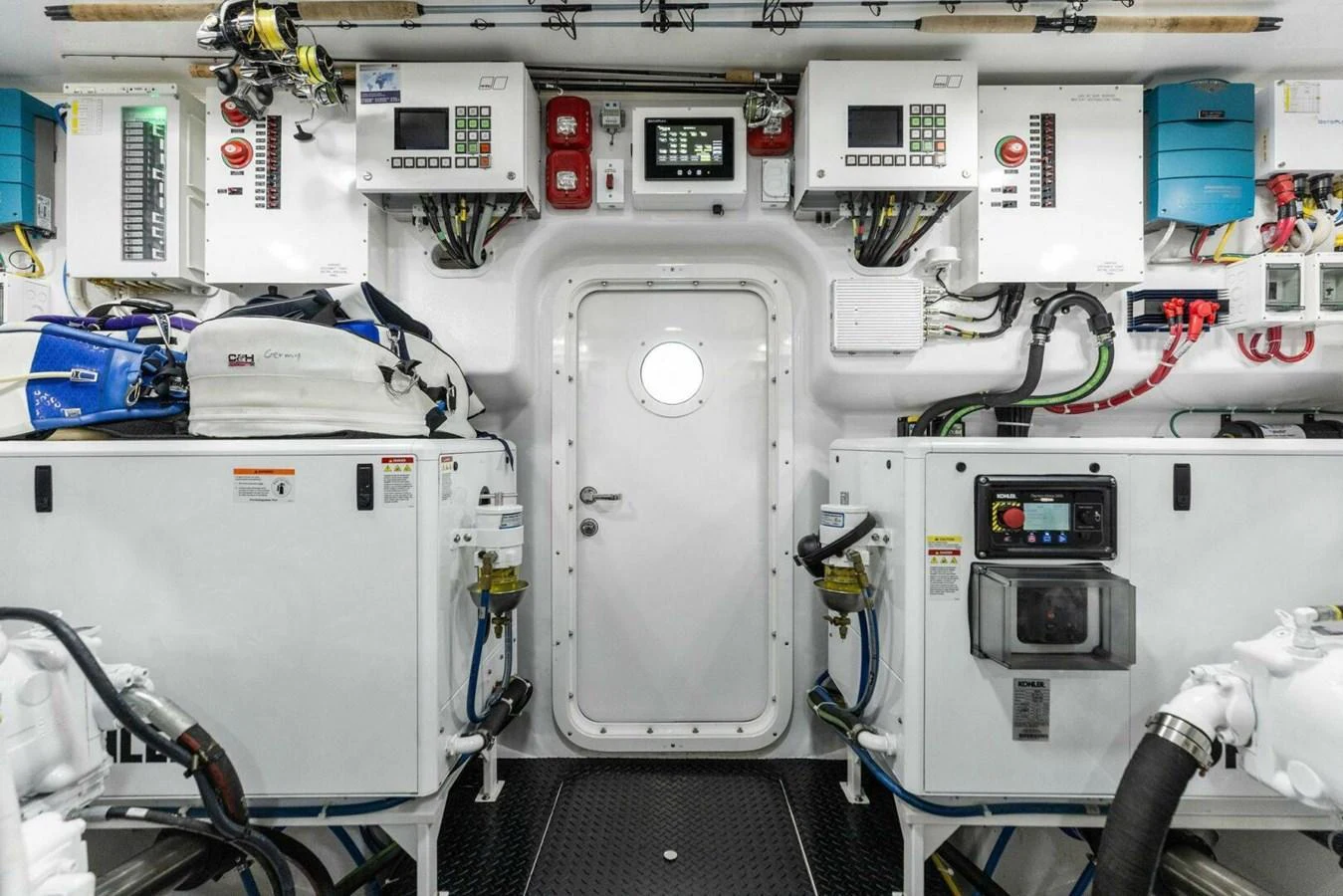The engine room is equipped with advanced machinery and control panels, ensuring optimal performance and safety. aboard TEAM HARVEY I Yacht for Sale