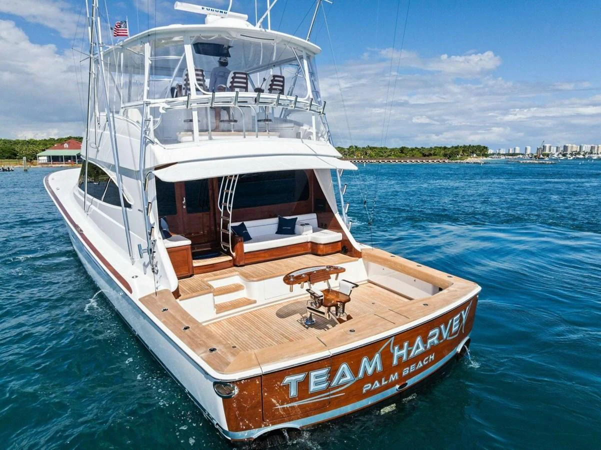 The yacht's aft deck offers a spacious and inviting area for relaxation and entertainment on the water. aboard TEAM HARVEY I Yacht for Sale