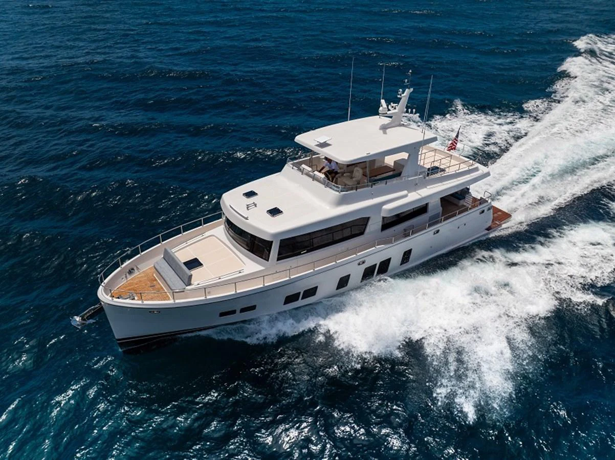 A sleek and modern yacht cruises through the open sea, showcasing its elegant design and spacious decks. aboard NEW BOAT Yacht for Sale