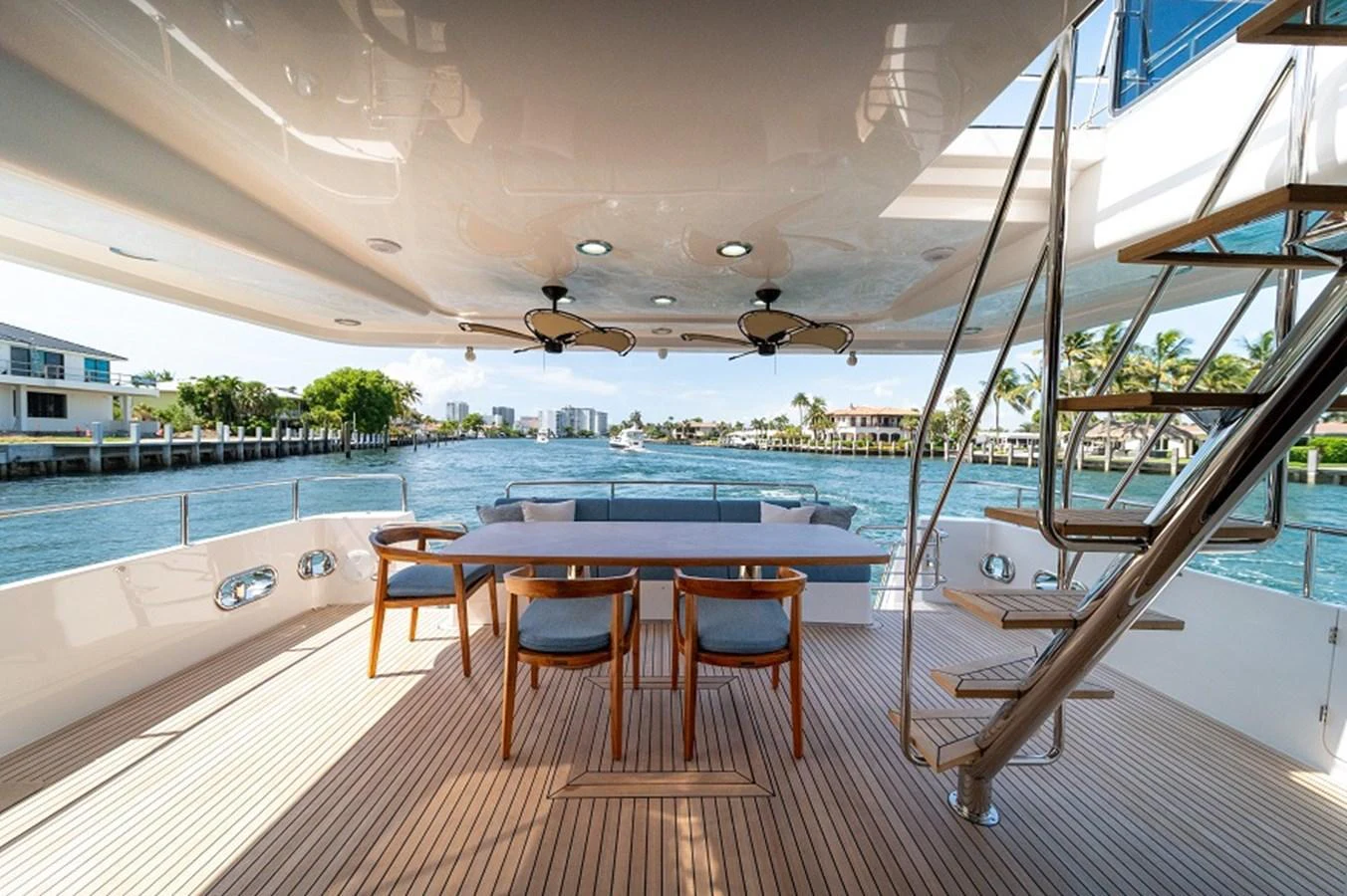 The aft deck offers a spacious and inviting area for relaxation and dining with a stunning view of the water. aboard NEW BOAT Yacht for Sale