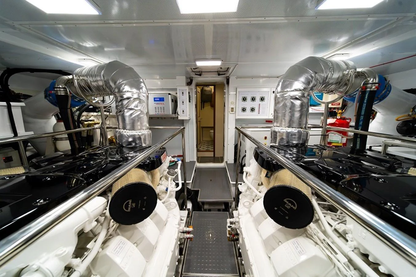 The engine room showcases advanced machinery and a meticulously organized layout. aboard NEW BOAT Yacht for Sale