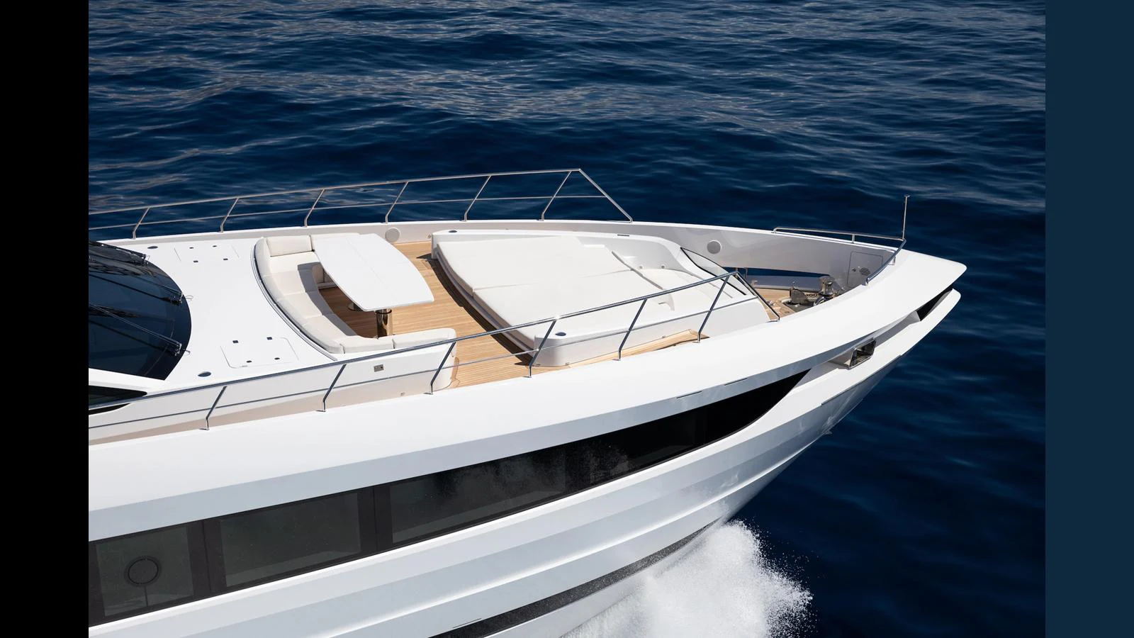 The sleek bow of the yacht cuts through the water with elegance. aboard ARTEMIS Yacht for Sale