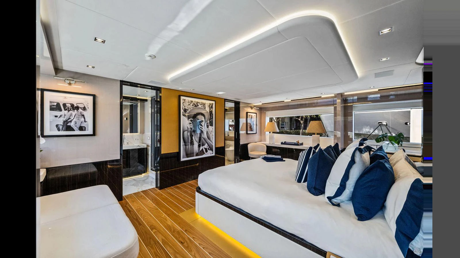 The master stateroom exudes luxury with its spacious layout, elegant decor, and modern amenities. aboard ARTEMIS Yacht for Sale