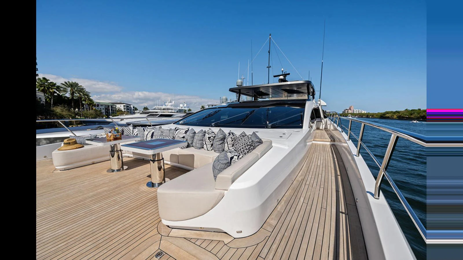 The foredeck features a spacious lounging area with plush seating and a sleek, modern design. aboard ARTEMIS Yacht for Sale