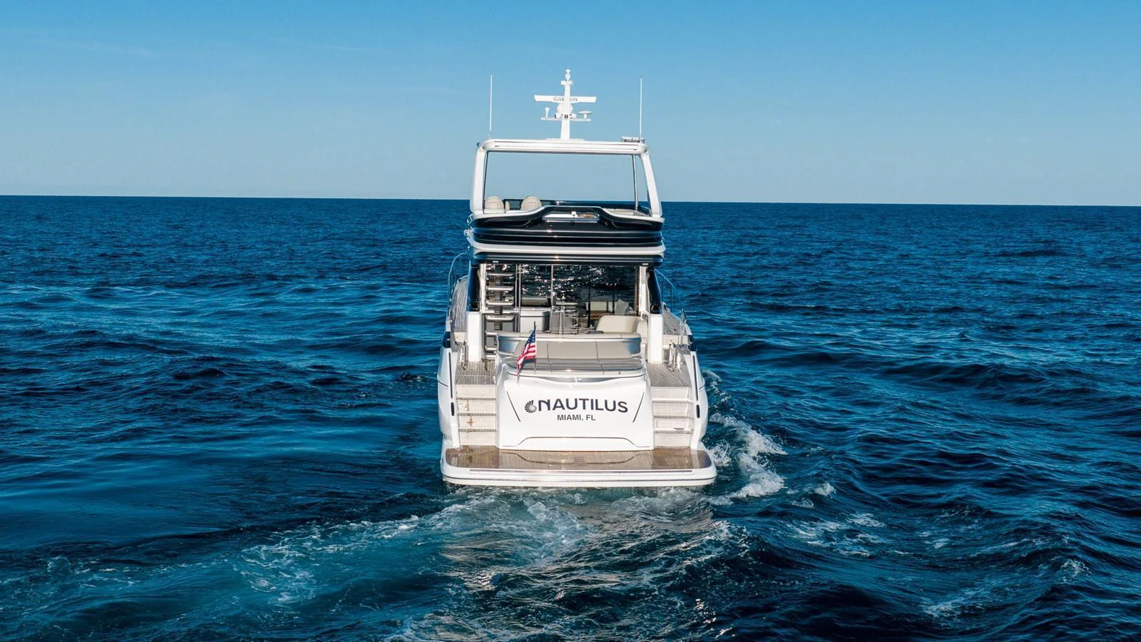 The yacht cruises gracefully on open waters, showcasing its sleek design and modern amenities. aboard NAUTILUS Yacht for Sale