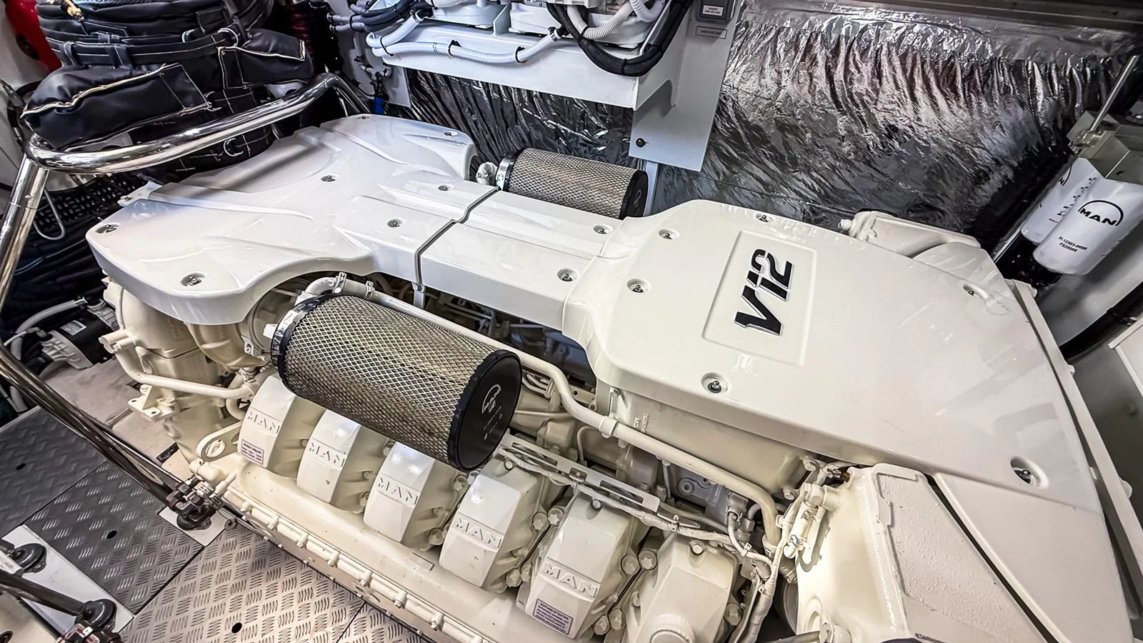 The image showcases the powerful V12 engine of the yacht, highlighting its engineering excellence. aboard NAUTILUS Yacht for Sale