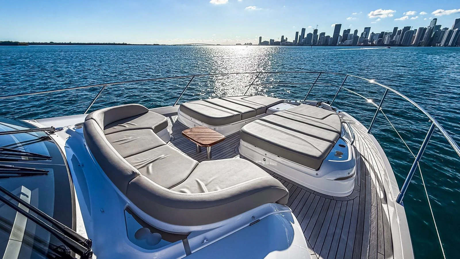 The foredeck features luxurious sun pads with a stunning view of the city skyline. aboard NAUTILUS Yacht for Sale