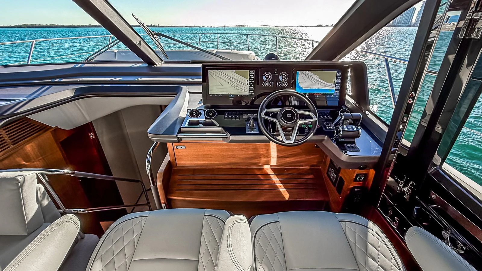 The helm station offers a commanding view with state-of-the-art navigation equipment and luxurious seating. aboard NAUTILUS Yacht for Sale