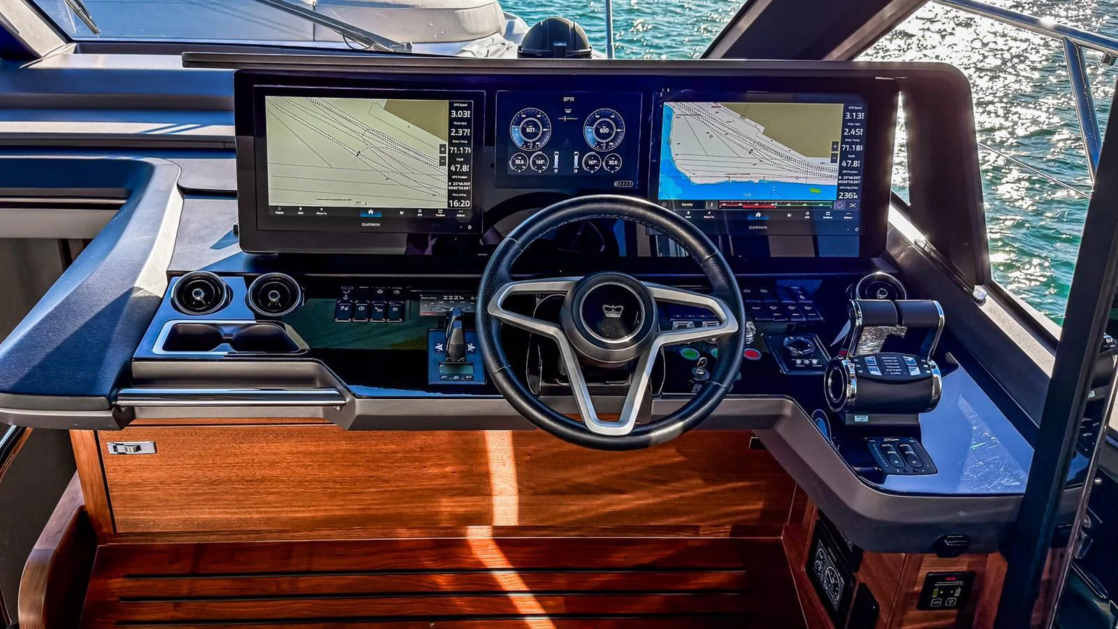 The helm station features advanced navigation systems and a sleek steering wheel, offering a commanding view for the captain. aboard NAUTILUS Yacht for Sale