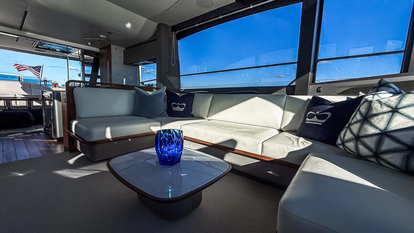 The salon features a spacious seating area with large windows providing stunning views. aboard NAUTILUS Yacht for Sale