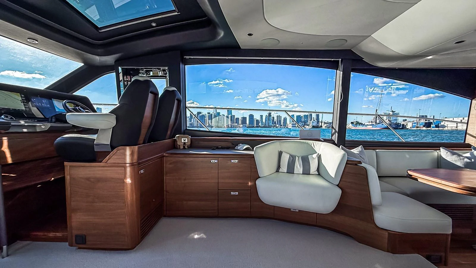 The helm area offers a luxurious view with a sleek design and panoramic windows. aboard NAUTILUS Yacht for Sale