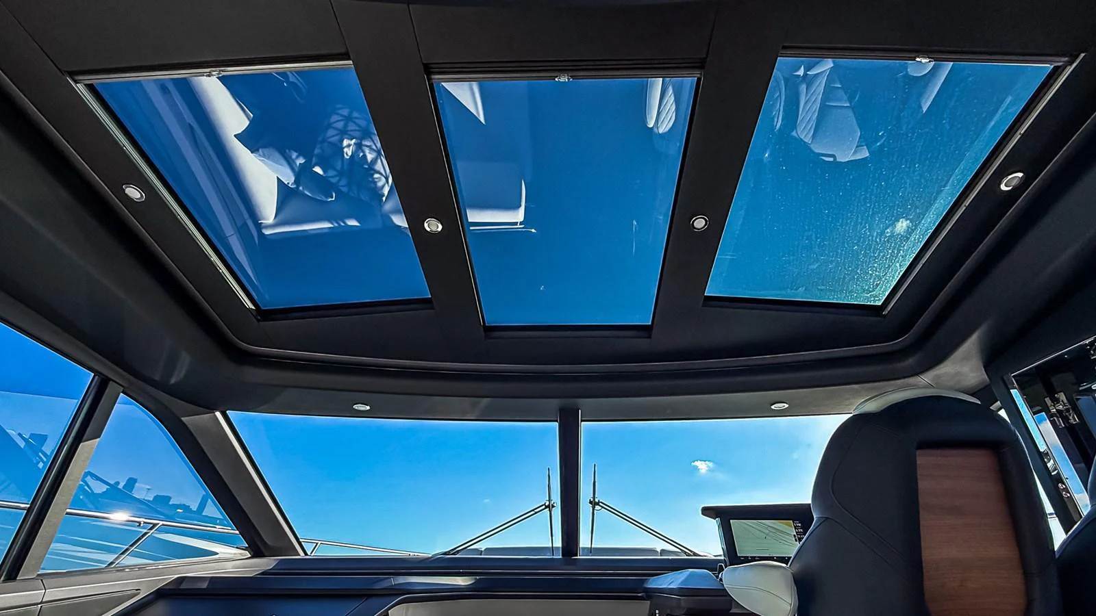 The helm area features large skylights that offer a panoramic view of the sky and surroundings. aboard NAUTILUS Yacht for Sale