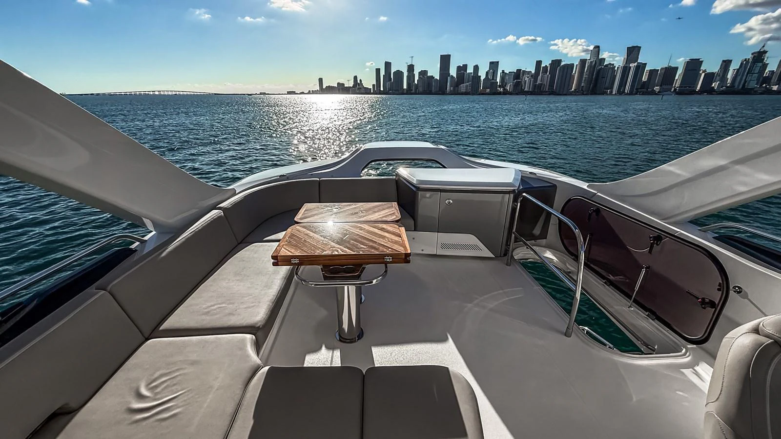 The flybridge offers a stunning view of the city skyline and open water, perfect for relaxation and entertainment. aboard NAUTILUS Yacht for Sale