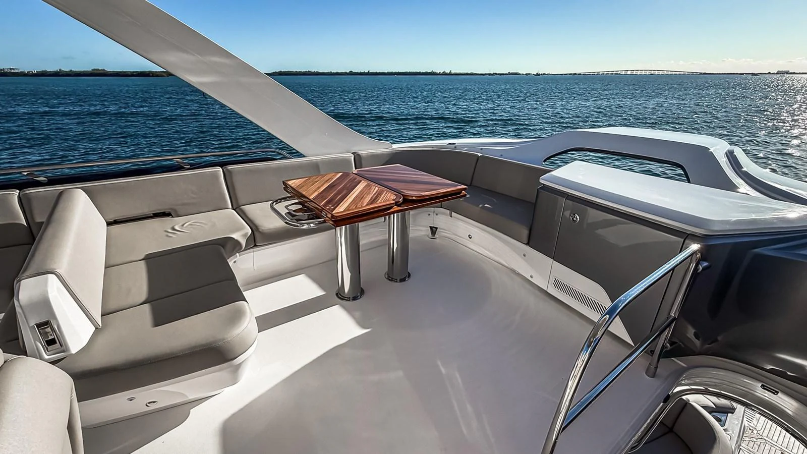 The flybridge offers a spacious and luxurious seating area with a stunning view of the water. aboard NAUTILUS Yacht for Sale