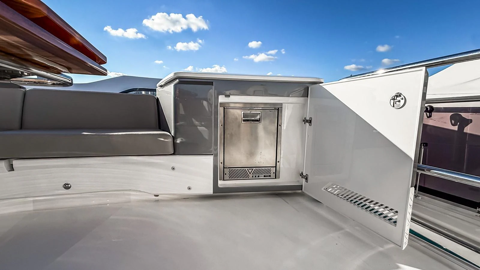 A sleek outdoor storage compartment with a stainless steel interior is showcased on the yacht. aboard NAUTILUS Yacht for Sale