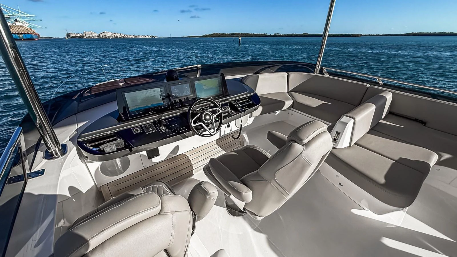 The helm station offers a panoramic view with state-of-the-art navigation equipment and comfortable seating. aboard NAUTILUS Yacht for Sale