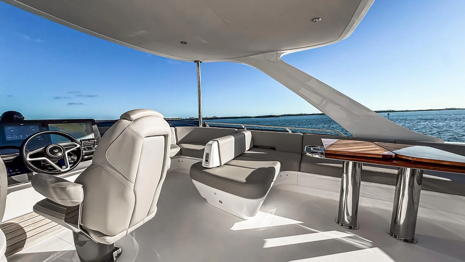 The helm area offers a sleek and modern design with panoramic views of the sea. aboard NAUTILUS Yacht for Sale