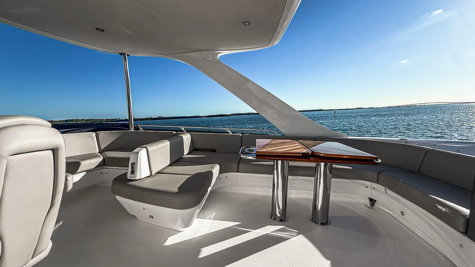 The flybridge offers a spacious seating area with stunning ocean views. aboard NAUTILUS Yacht for Sale