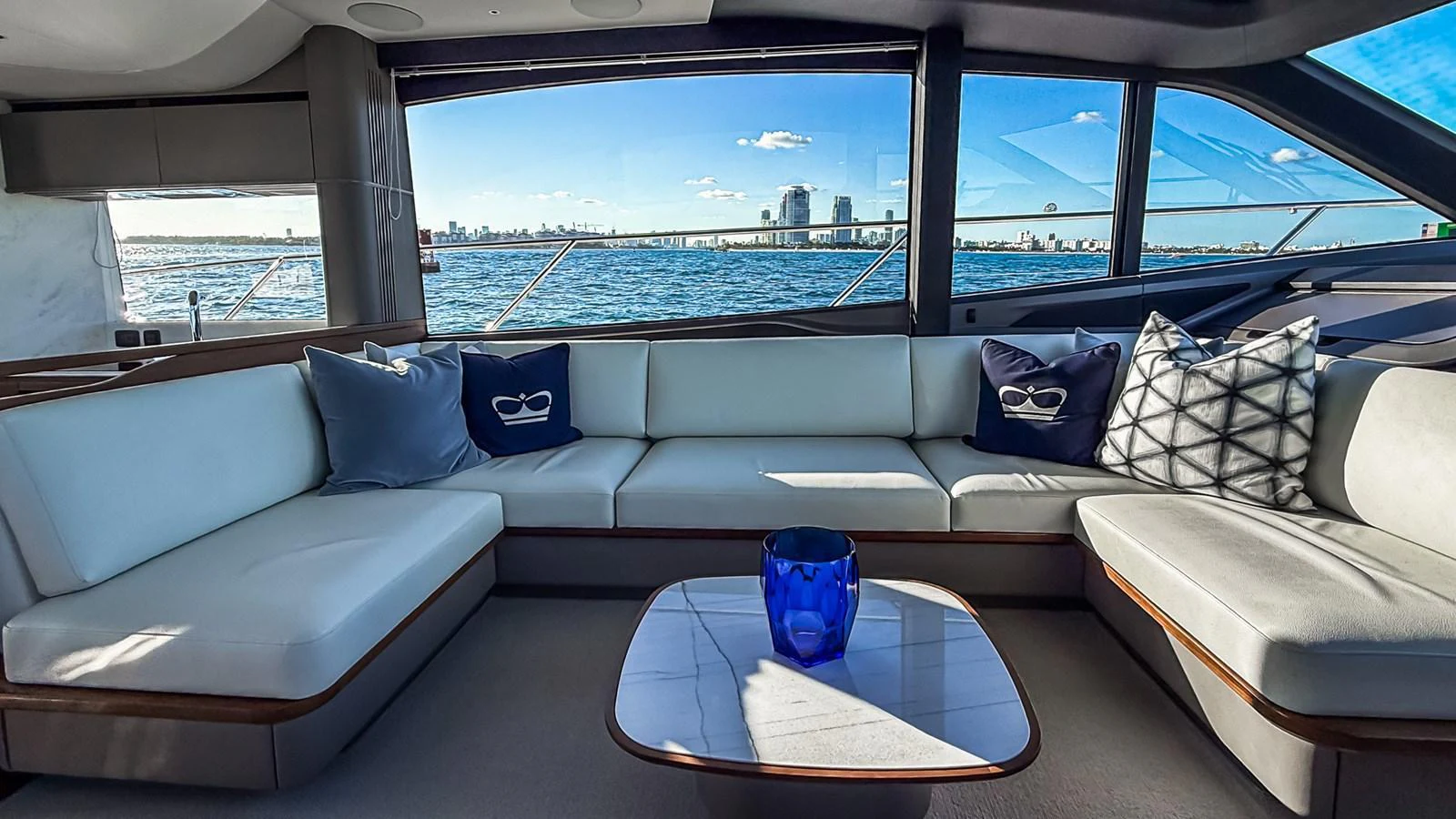 The salon offers a luxurious seating area with panoramic views of the water. aboard NAUTILUS Yacht for Sale