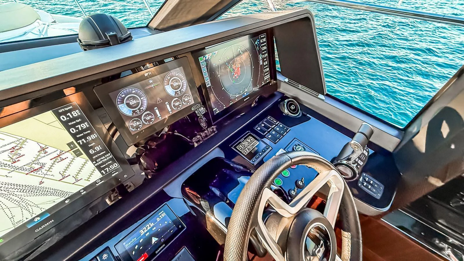 The helm station features advanced navigation equipment and a sleek, modern design. aboard NAUTILUS Yacht for Sale
