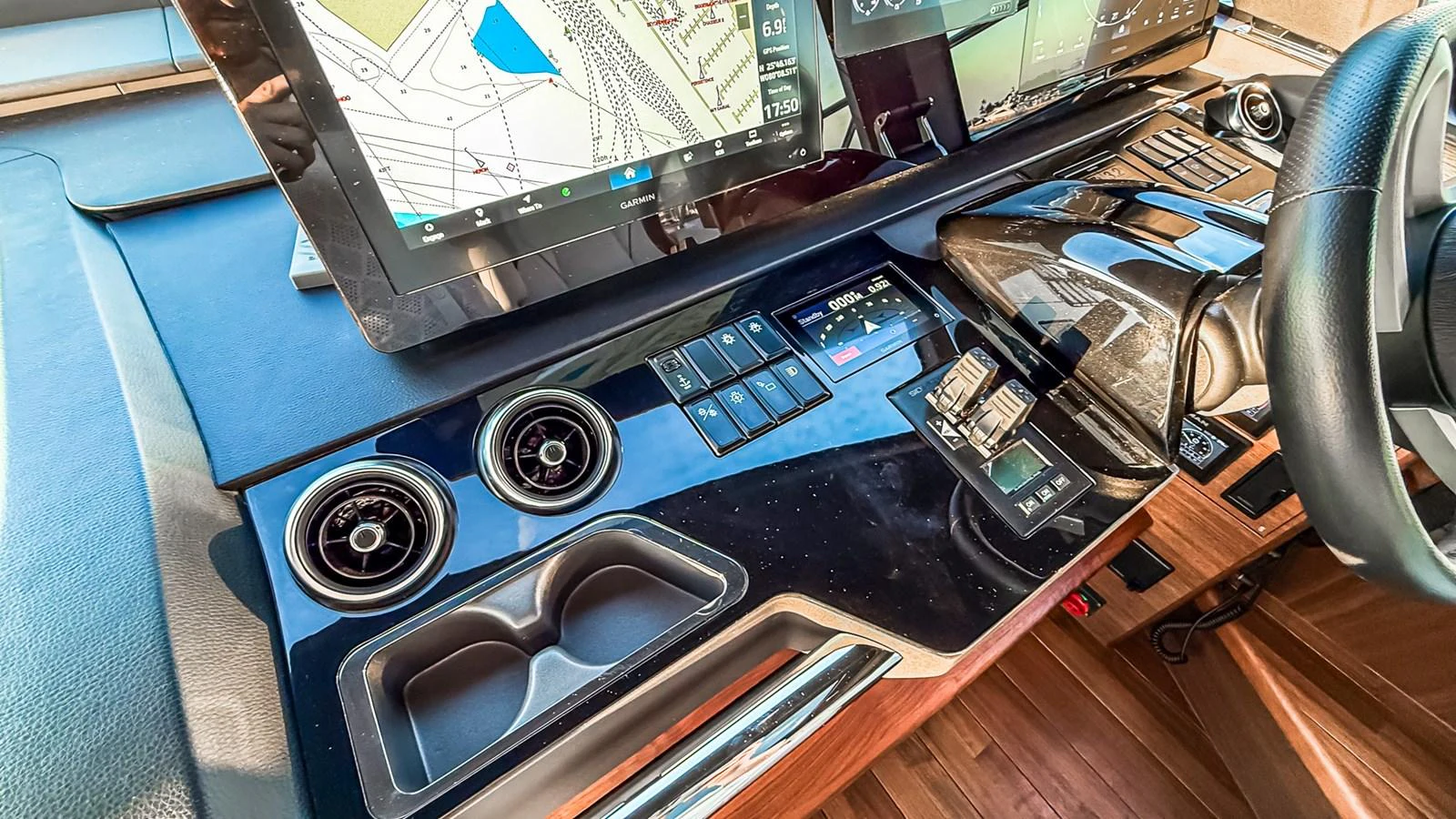 The helm station features advanced navigation equipment and a sleek, modern design. aboard NAUTILUS Yacht for Sale