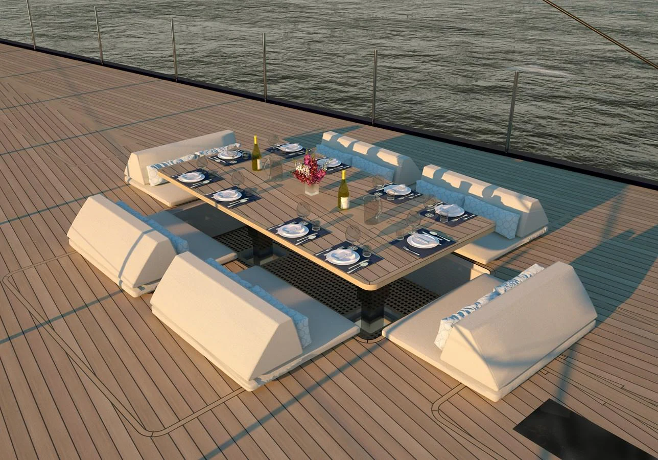 The yacht features a beautifully set outdoor dining area on the deck, perfect for alfresco meals with a view of the water. aboard WILDCAT Yacht for Sale