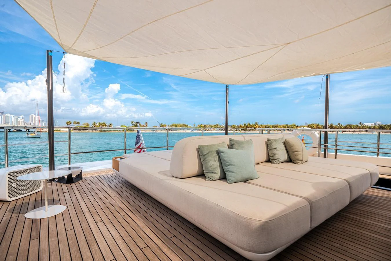 The sundeck offers a spacious lounging area with comfortable seating and a stunning view of the water. aboard TYCOON Yacht for Sale