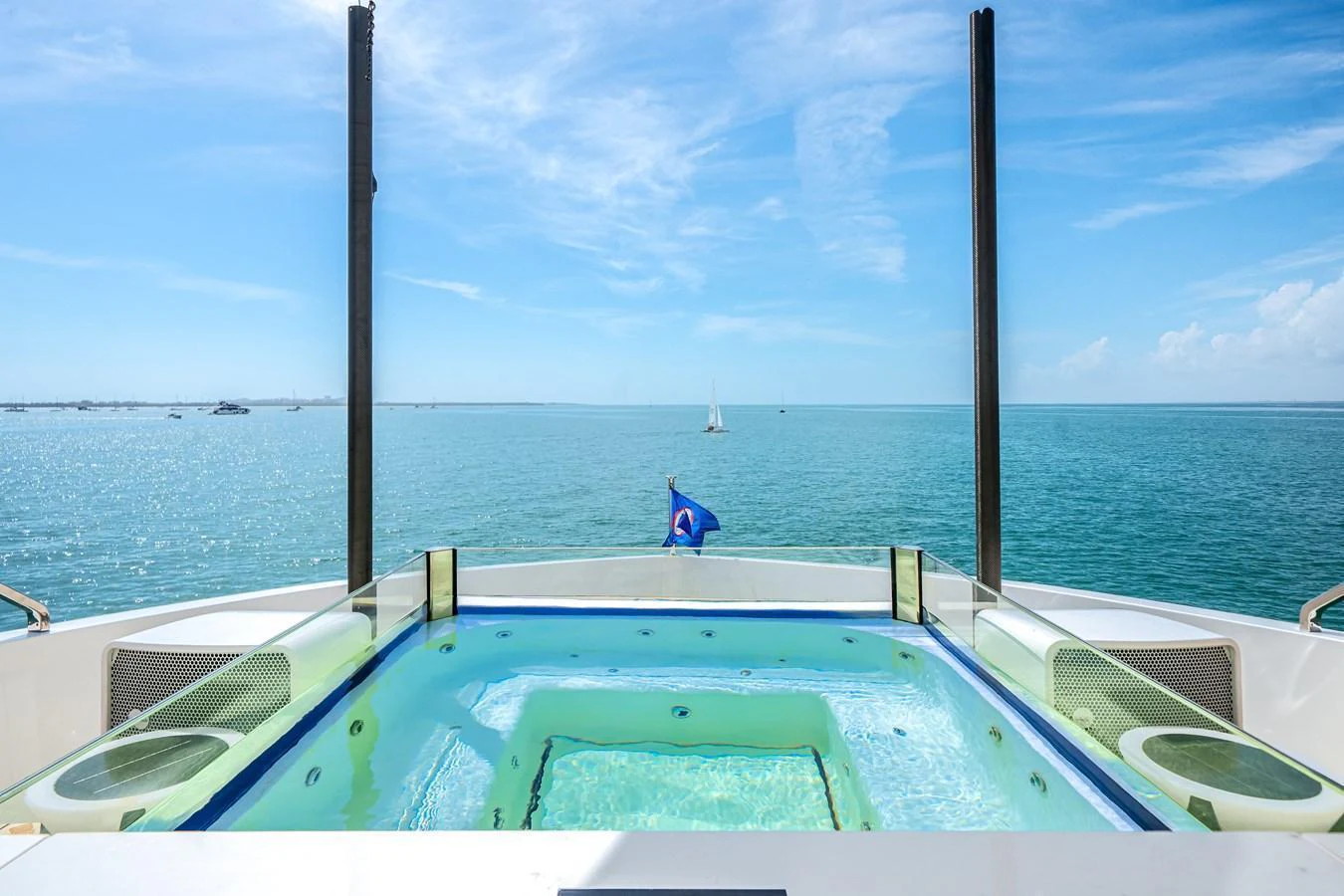A luxurious jacuzzi on the yacht offers stunning ocean views. aboard TYCOON Yacht for Sale