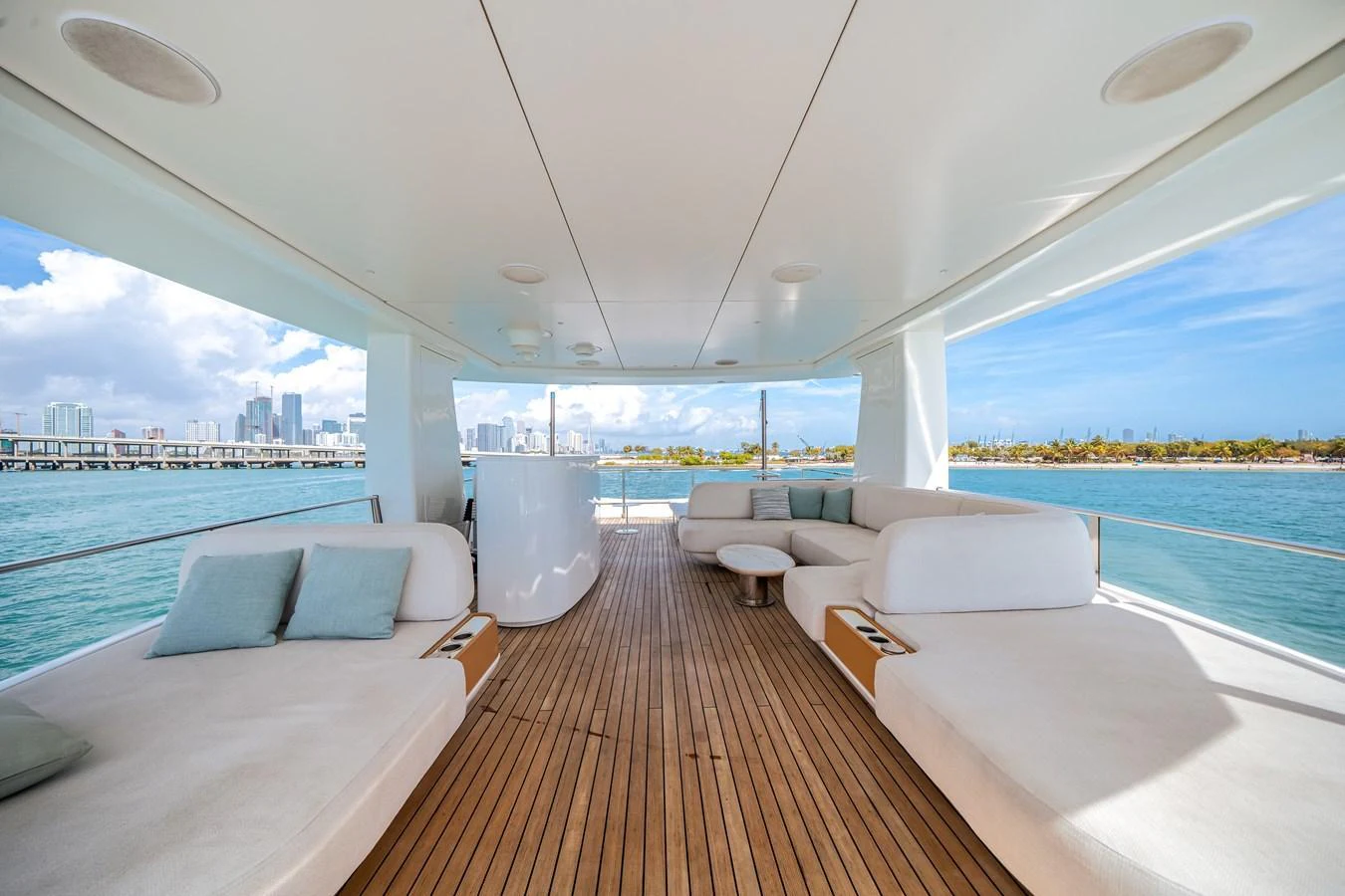 The aft deck offers a spacious and inviting area with comfortable seating and stunning views of the water. aboard TYCOON Yacht for Sale