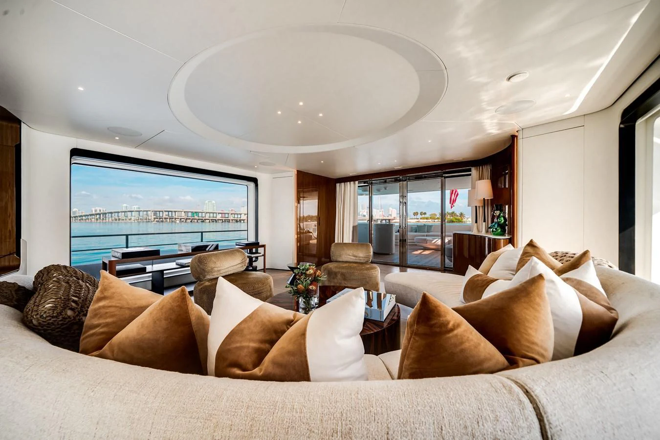 The salon features a spacious and elegantly designed seating area with panoramic views. aboard TYCOON Yacht for Sale