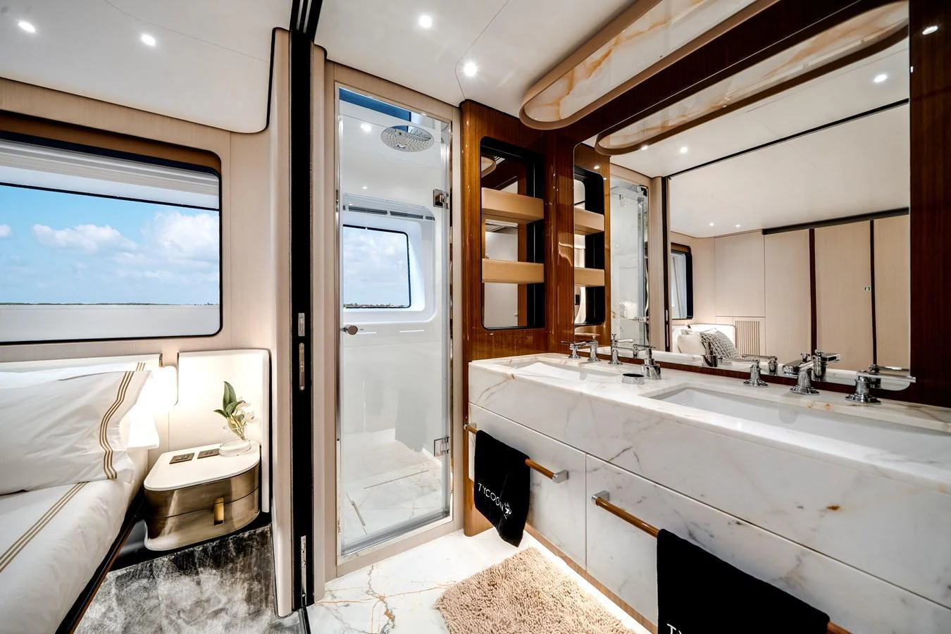 The yacht's bathroom features luxurious marble countertops and modern fixtures, creating a serene and elegant space. aboard TYCOON Yacht for Sale