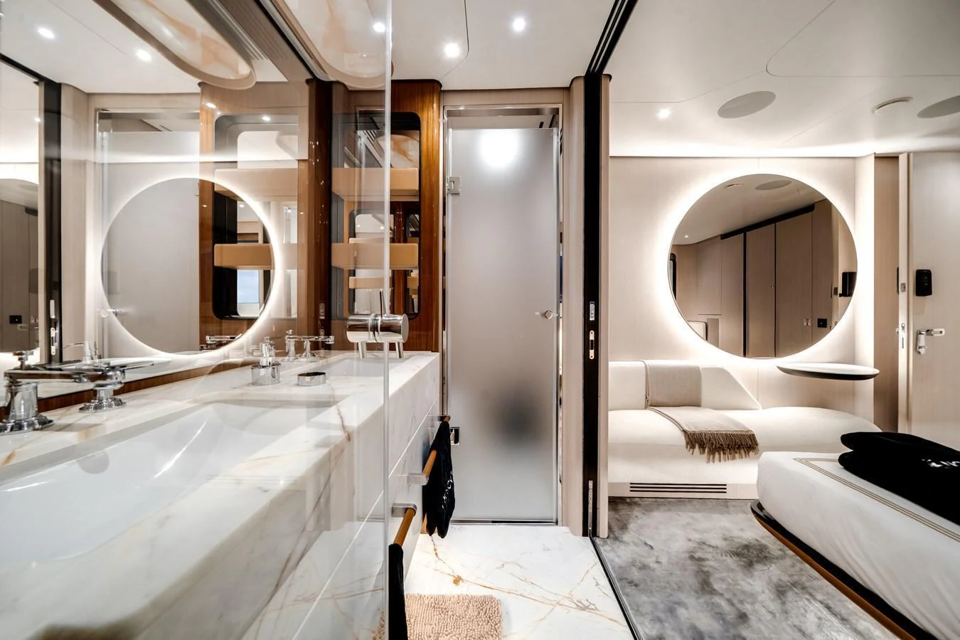 The yacht's bathroom features a luxurious design with modern fixtures and elegant lighting. aboard TYCOON Yacht for Sale