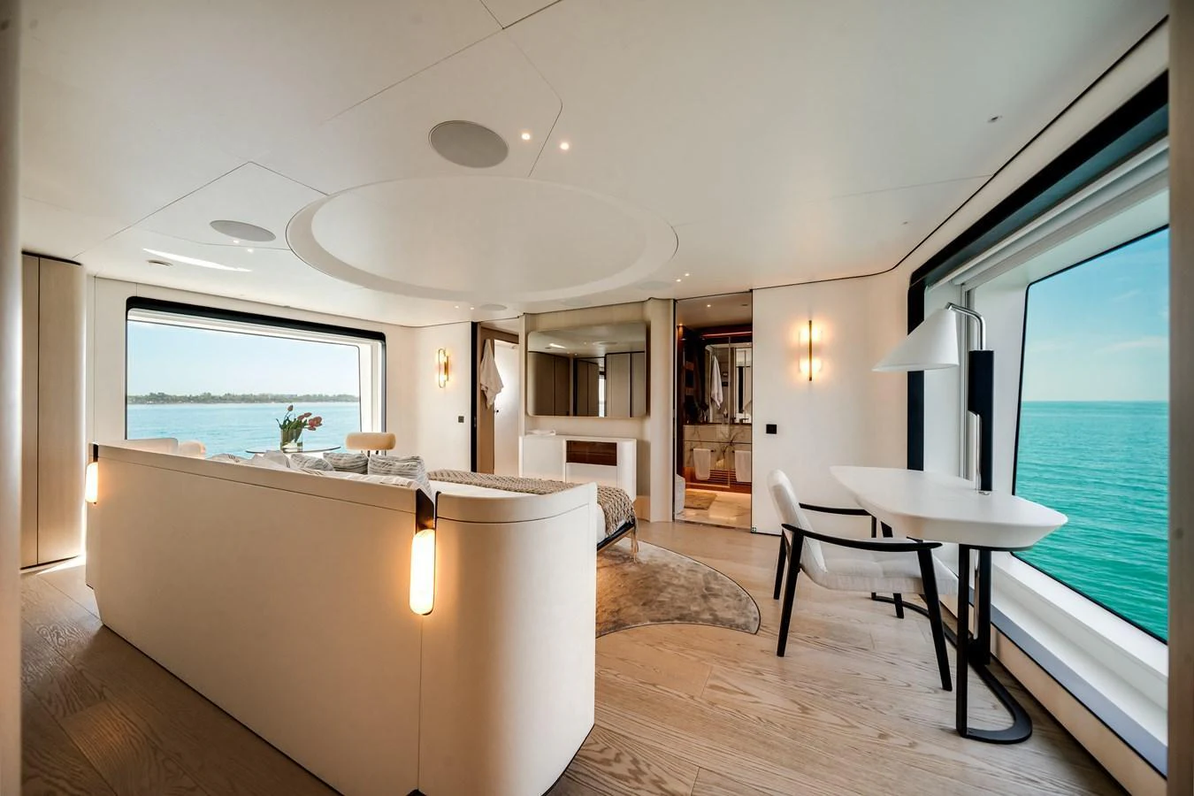 The salon offers a spacious and elegant area with large windows providing stunning ocean views. aboard TYCOON Yacht for Sale