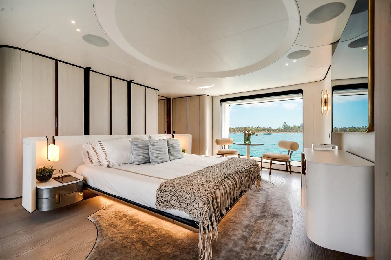 The master stateroom offers a luxurious and serene retreat with a stunning view of the water. aboard TYCOON Yacht for Sale