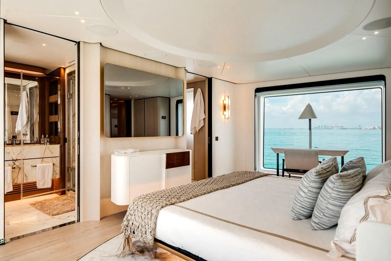The master stateroom offers a luxurious and serene retreat with stunning ocean views. aboard TYCOON Yacht for Sale