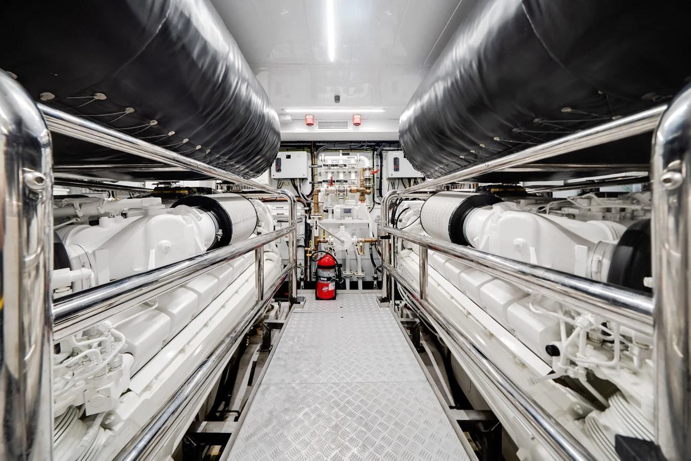 The engine room showcases powerful machinery and a pristine, well-organized layout. aboard TYCOON Yacht for Sale